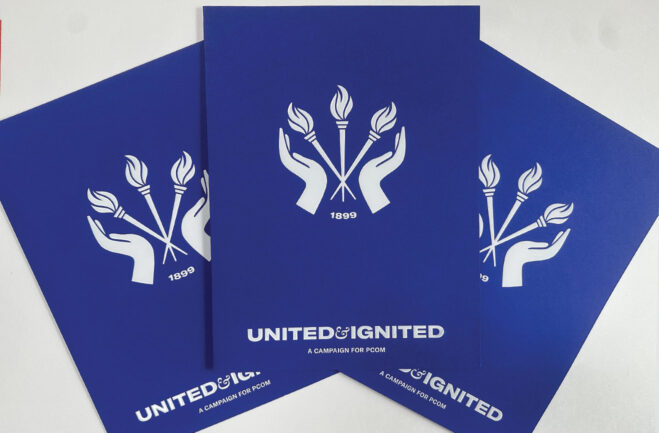 United & Ignited campaign folder with a logo designed by Studio Usher foil stamped on Neenah paper